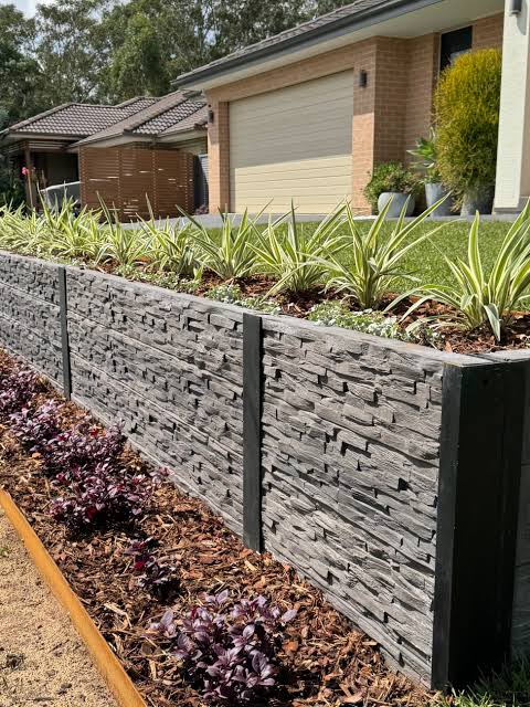 Retaining wall construction process on Northern Beaches site